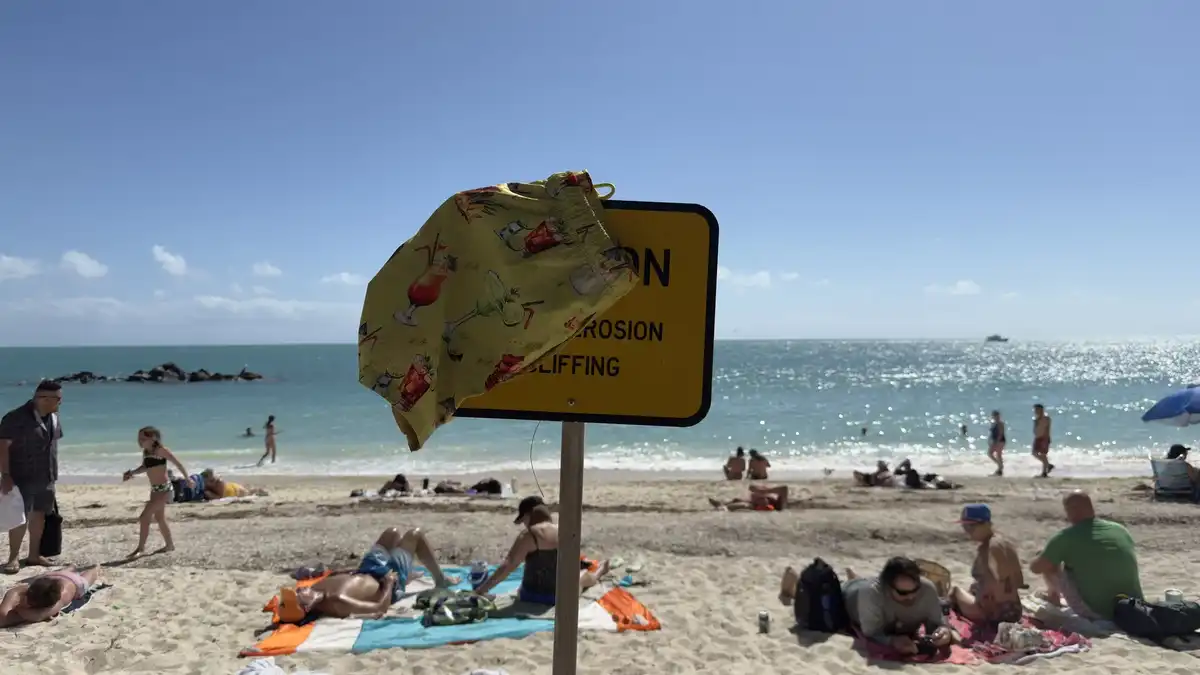Beachgoers enjoying a sunny day at Fort Zachary Taylor