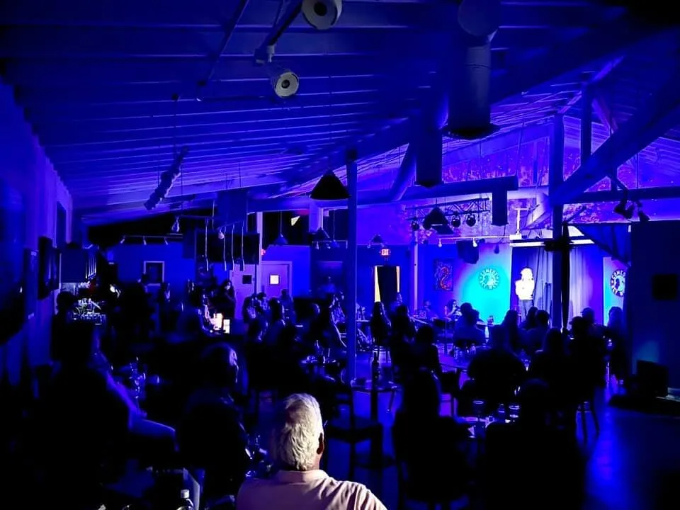 Comedy night at Key West Theater with blue stage lighting