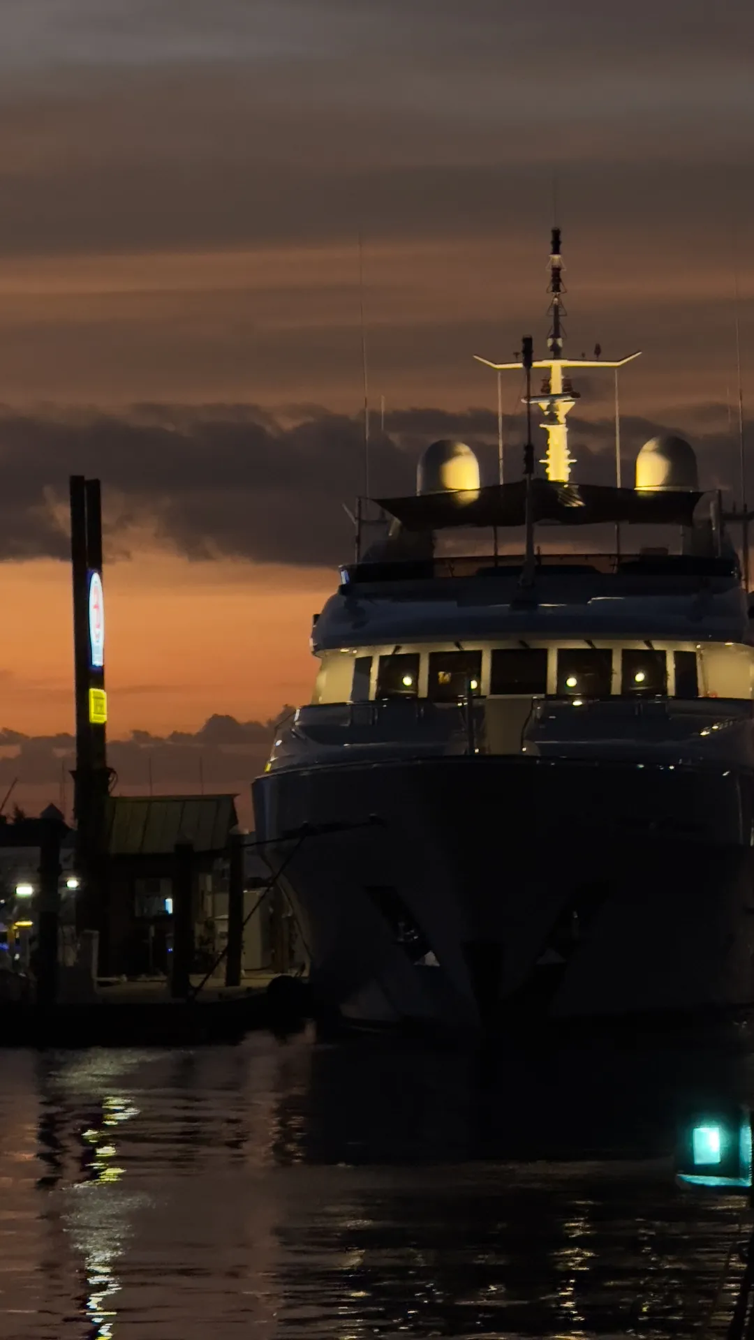 Yacht docked at Key West harbor at sunset